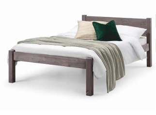 A wooden bed stained grey